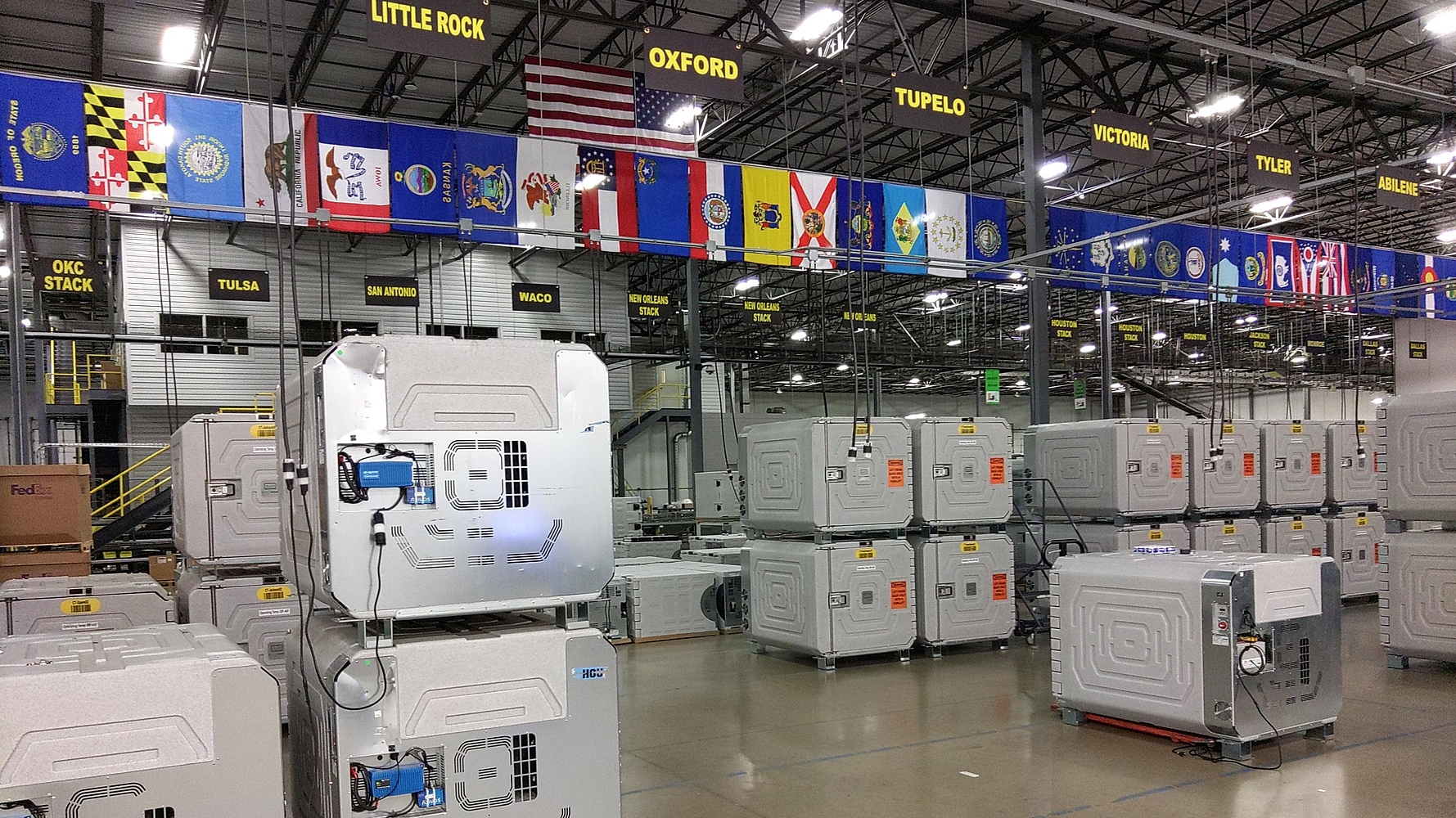 Coldtainer AuO in Morris & Dickson warehouse connected to the AC mains for battery recharge